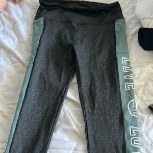 Women leggings turquoise design on side with “love” writing